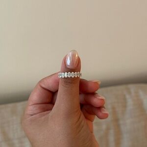 Moissanite oval eternity band